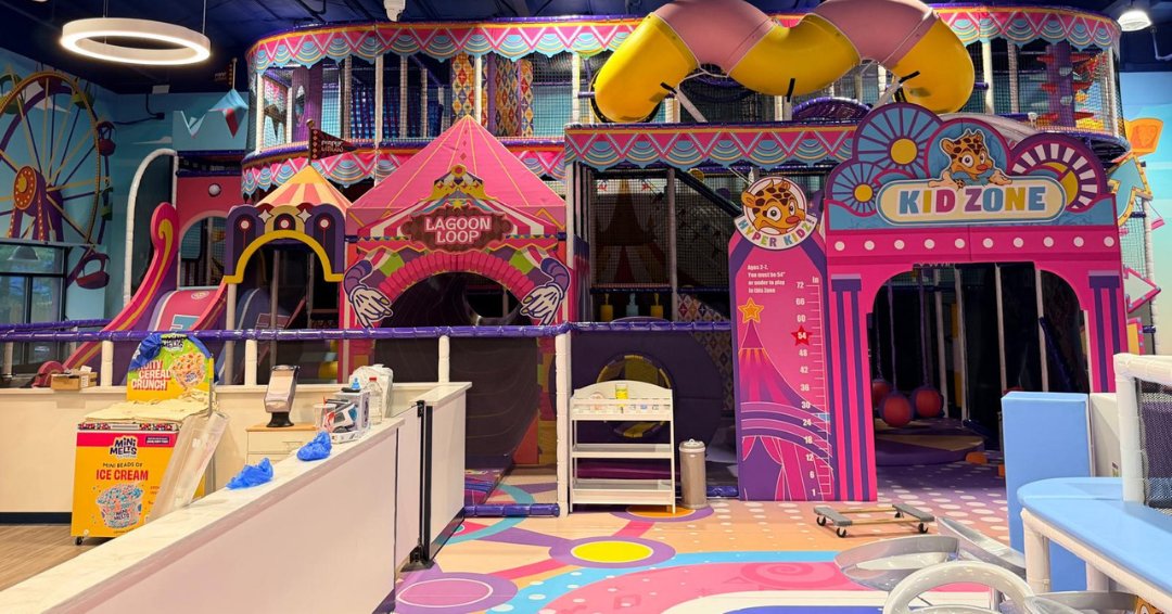 Circus-themed Kid Zone and multi-level play structure at Hyper Kidz Richmond indoor playground